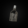 Men Mansion Sea Texture Spray – schwarze Flasche auf dunklem Hintergrund